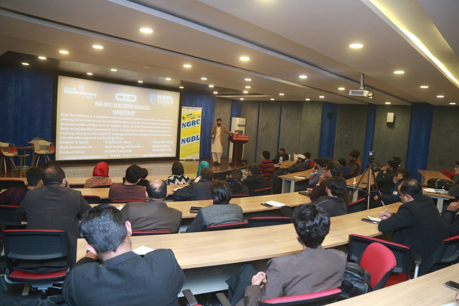 An NGBC speaker presenting to a professional workshop audience